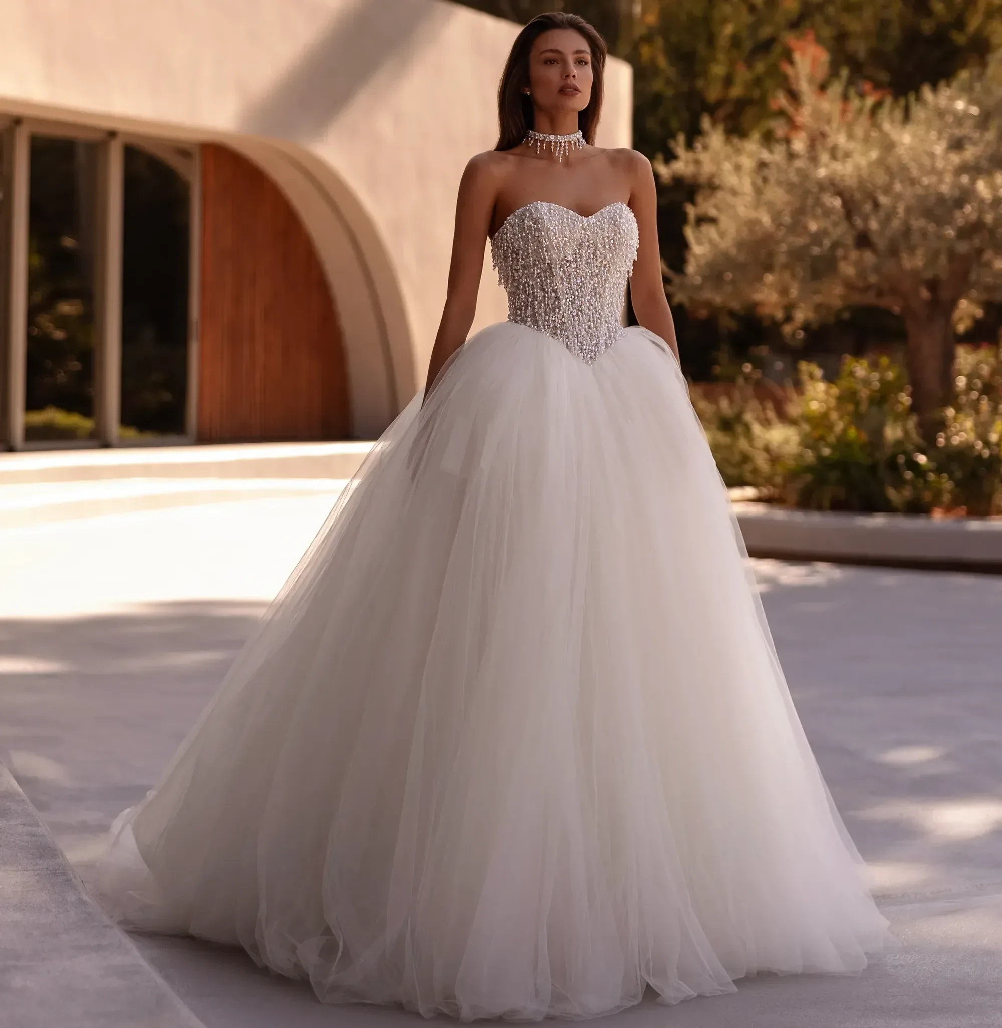 Model wearing a gown by Demetrios