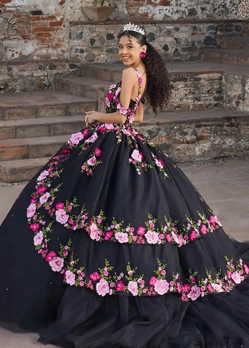 Model wearing a black dress