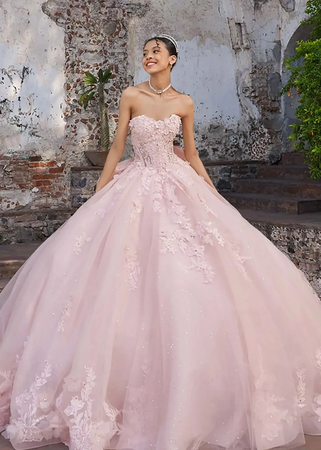Model wearing a pink dress