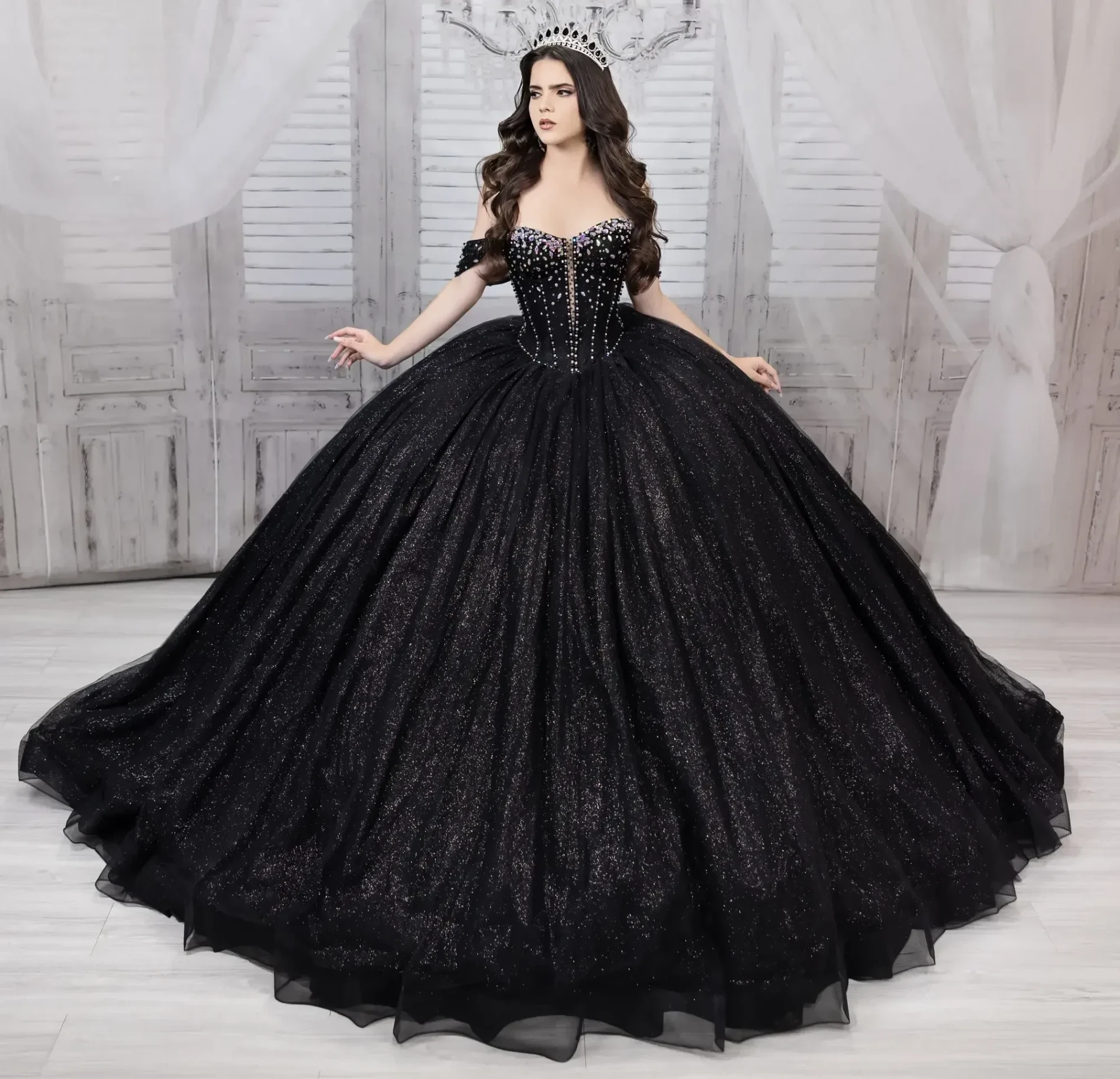 Model wearing a black dress