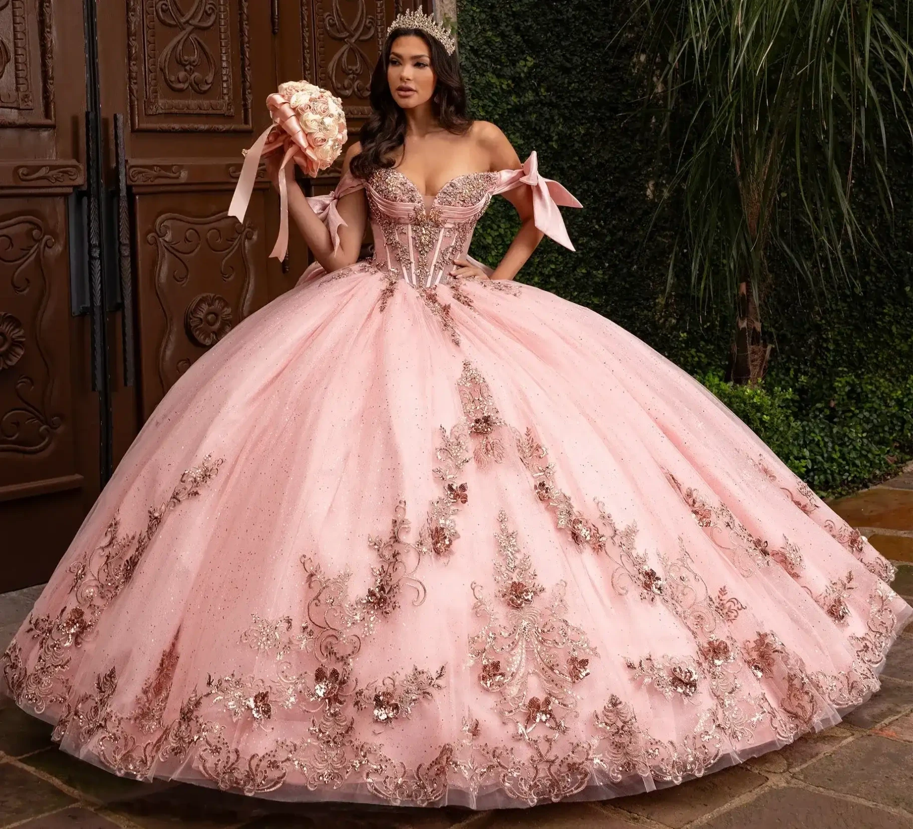 Model wearing a flesh color dress